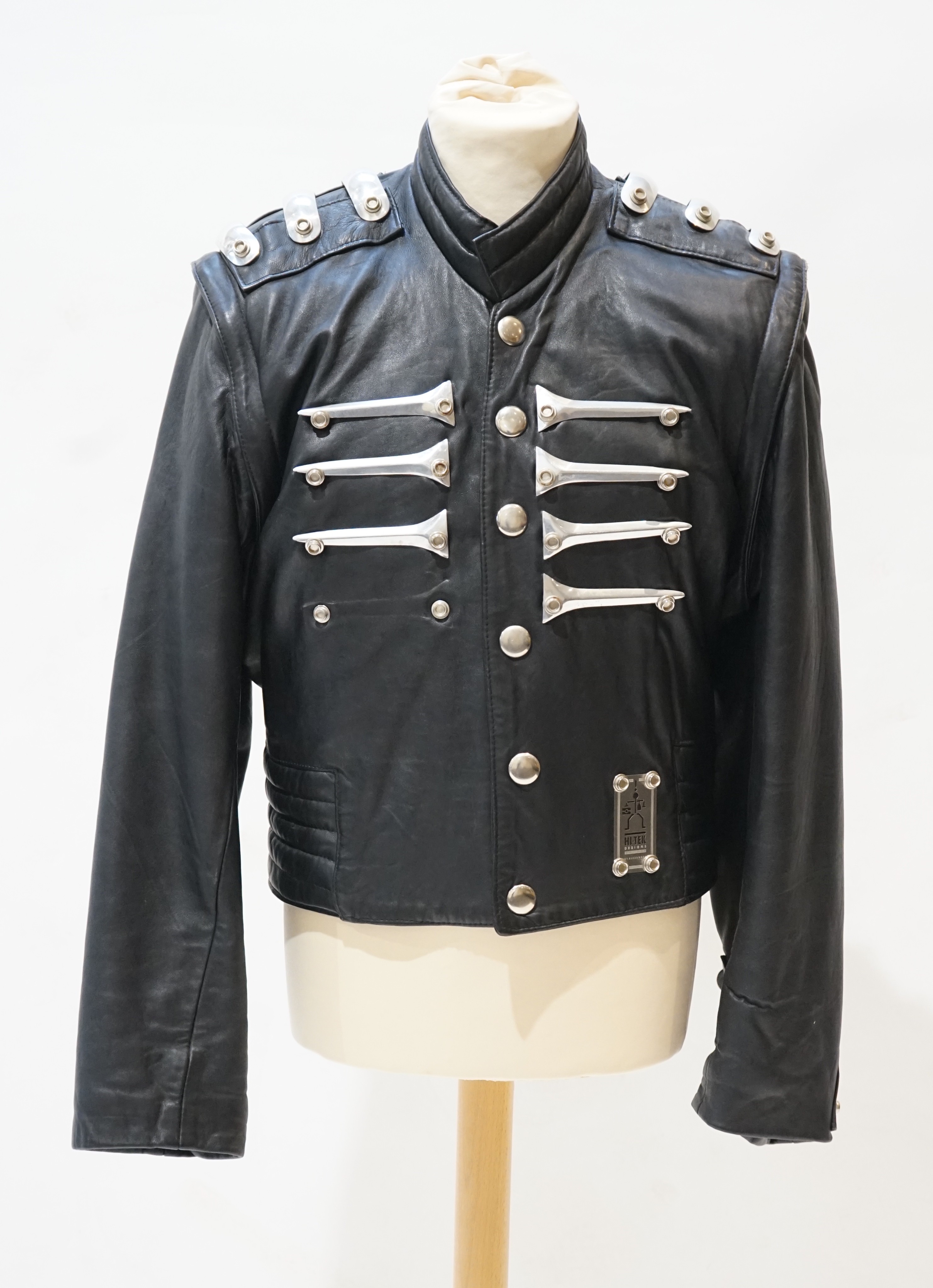 A gentleman's Alexander Hi-Tech padded leather bomber jacket with rivetted steel appliques and detachable arms, size medium